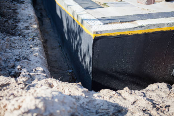 Professional Waterproofing technician working in Retsof, NY